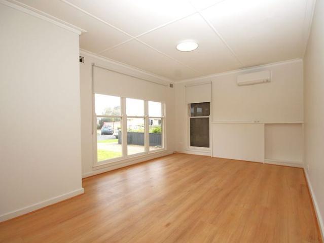 Renovated & updated home with spacious rear yard
