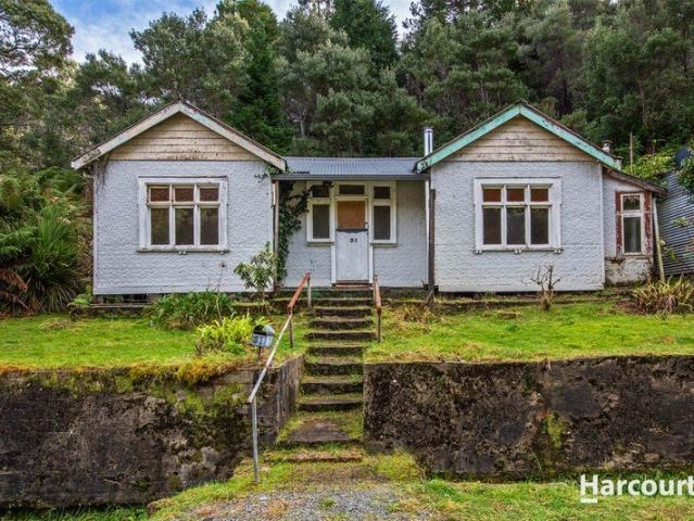 Renovator Opportunity with Room to Make Your Mark!