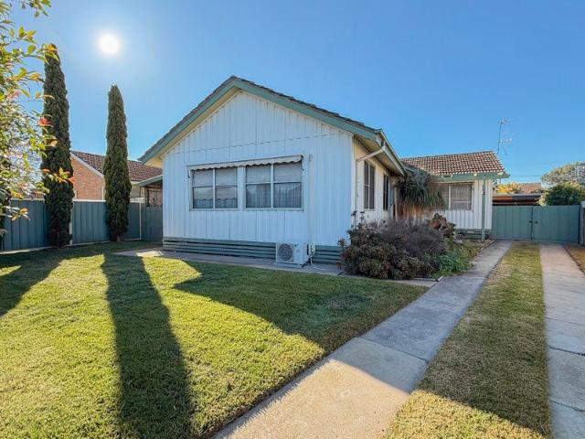 Renovator's Opportunity in Convenient Location