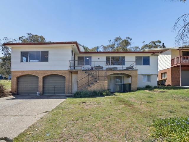 Renovator's Opportunity with Lake Views in the Heart of Anglers Reach