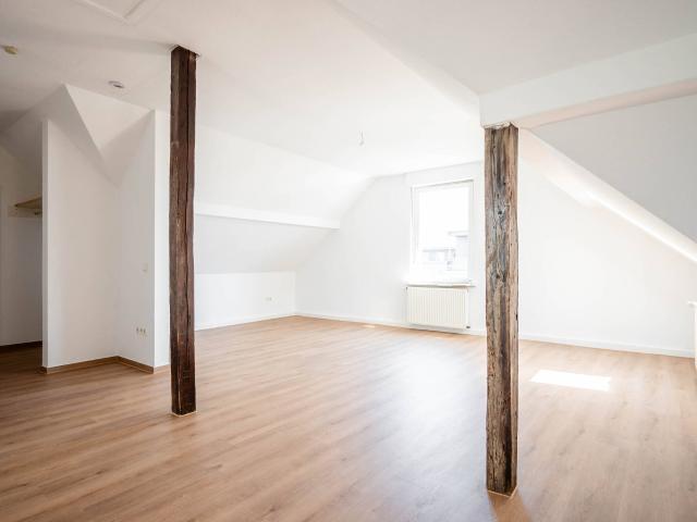 Renovierte Dachgeschosswohnung mit Einbauküche und Fernblick in Bielefeld Mitte