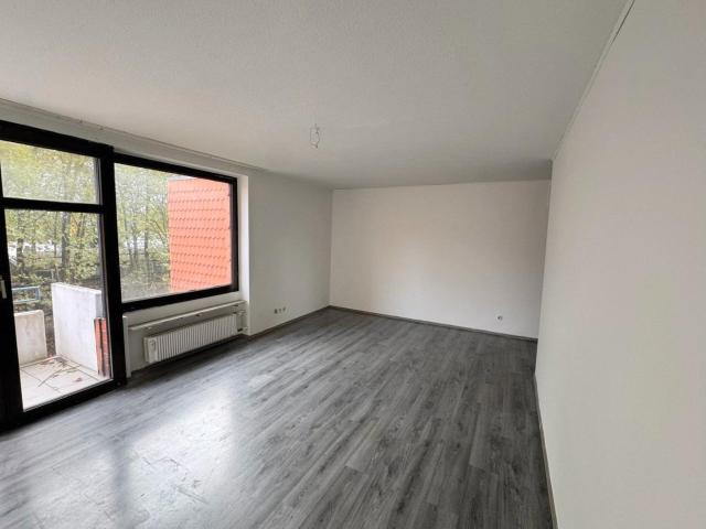 Renovierte Wohnung mit Balkon, Garten und Tiefgarage direkt am Schlosspark Strünkede