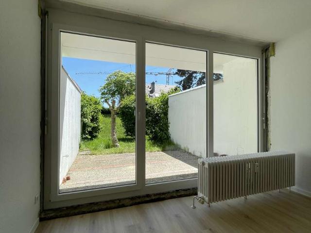 Renovierte 1 Zimmer Wohnung mit Terrasse und TG Doppelparker