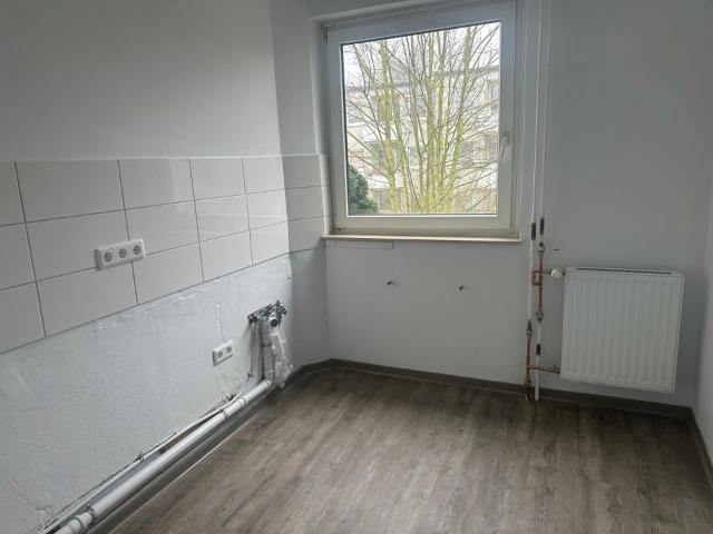 Renovierte 2,5 Zimmer Wohnung im Erdgeschoss