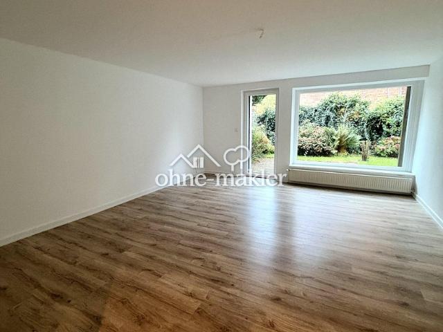 Renovierte 2 Zimmer Wohnung im EG mit Südterrasse, Garten und Stellplatz