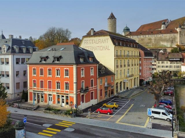Renoviertes gemischt genutztes Gebäude im Zentrum von Porrentruy