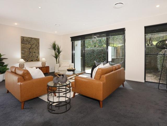 Ready to move in Immaculate Duplex in the Heart of Royal Pines Resort