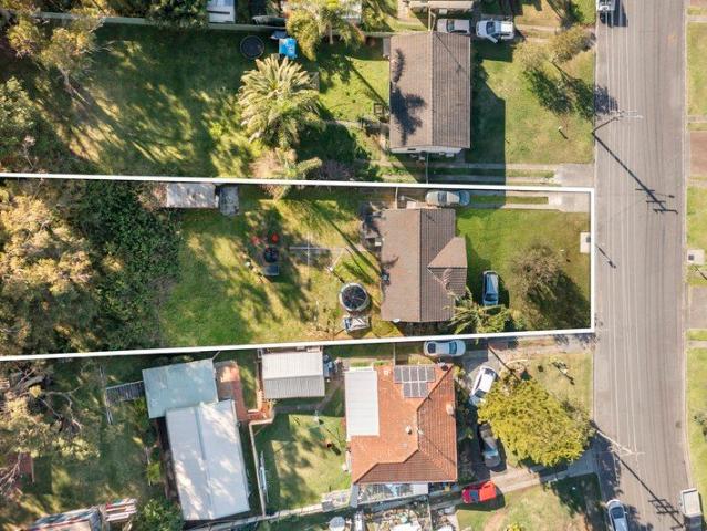 Ready to Renovate or Potential Development Jackpot for Visionary Buyers