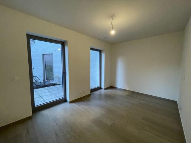 Recent 1 slaapkamerappartement met ruim terras