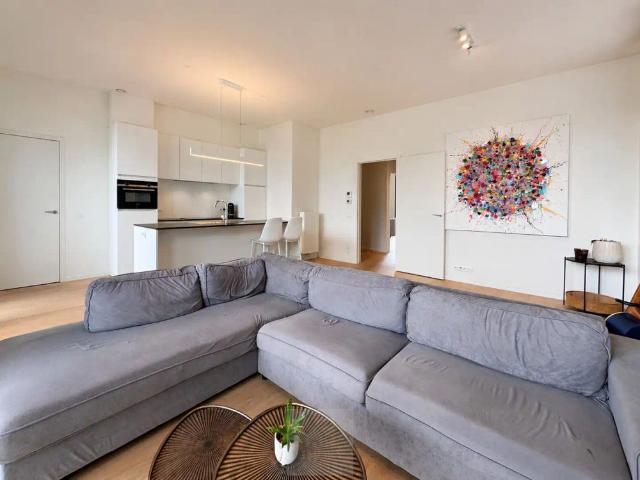 Recent gelijkvloers 2 slaapkamerappartement met tuin aan de Leieboorden
