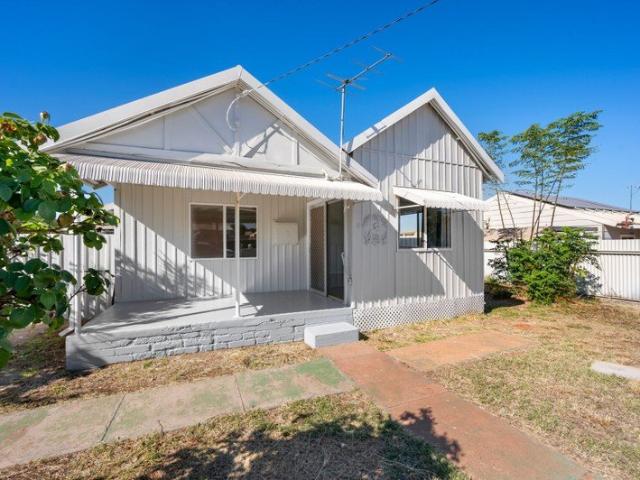 Recently renovated home with large yard and shed