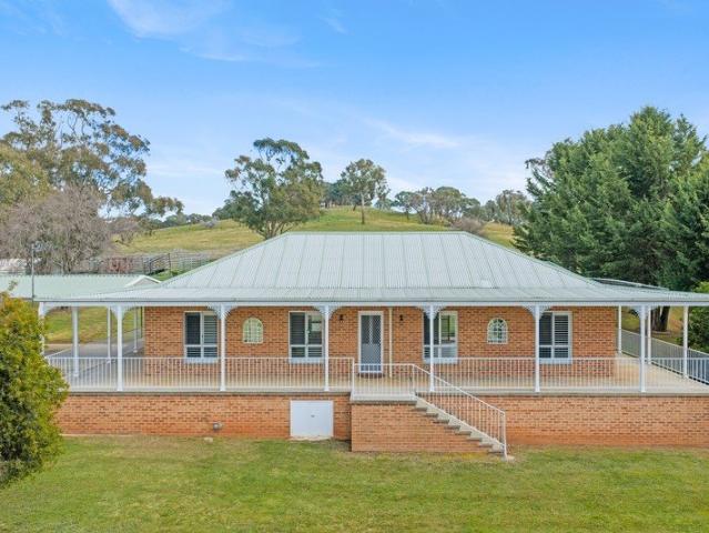 RECENTLY RENOVATED HOME ON 7.3 ACRES