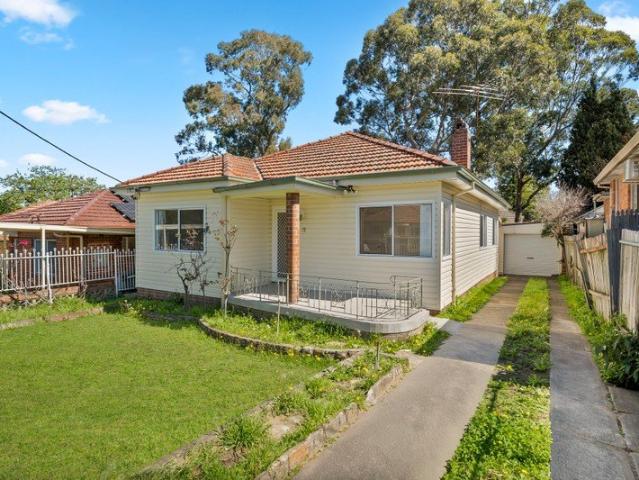 Recently Renovated Three Bedroom Home with Expansive Backyard and Prime Location