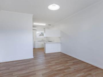 Recently Renovated Unit Offering Easy Care Living