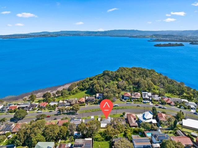 Recently Refreshed and Framed by Beautiful Lake Views