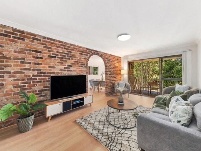 Recently refreshed, full brick apartment with generous proportions