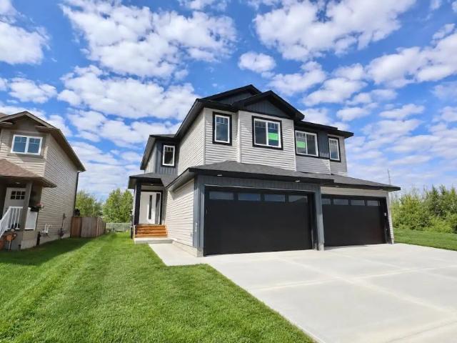 Redwater 3 Bed 2.5 Bathroom Half Duplex with Double Garage NOW FOR RENT! — 3 Bedrooms Duplex