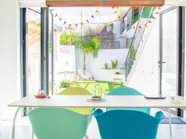 Redesigned Historical Home with a Green Patio