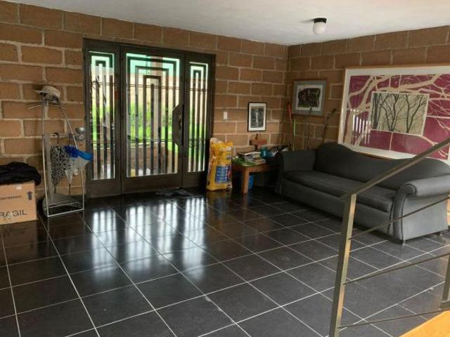 Refugio natural en San Miguel Ajusco: Espacio, Luz y Diseño