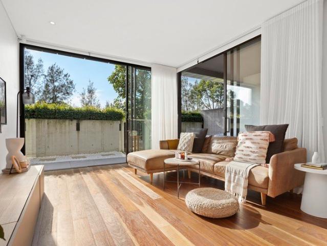 Refined Coastal Living in a Private, Award Winning Garden Setting