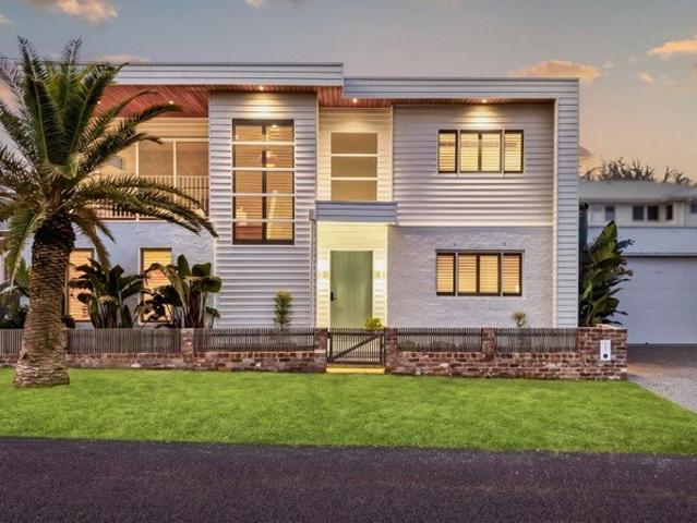 Refined Coastal Living with Premium Finishes and Dual Level Design