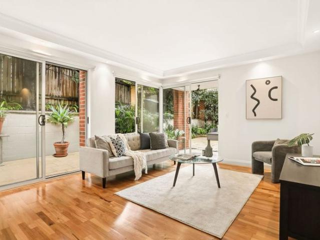 Refined Courtyard Residence with Exceptional Village Convenience