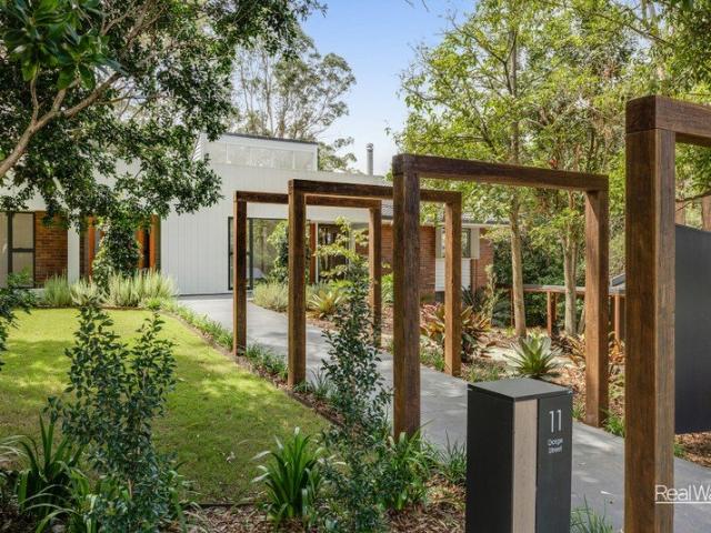 Refined Elegant Living in Middle Ridge with Elevated Escarpment Views