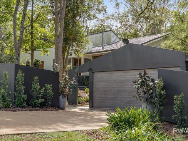 Refined Elegant Living in Middle Ridge with Elevated Escarpment Views