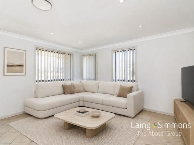 Refined Family Living in a Tranquil, Sought After Ropes Crossing Location!