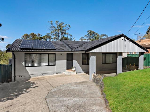 Refined family living in a peaceful bushland setting