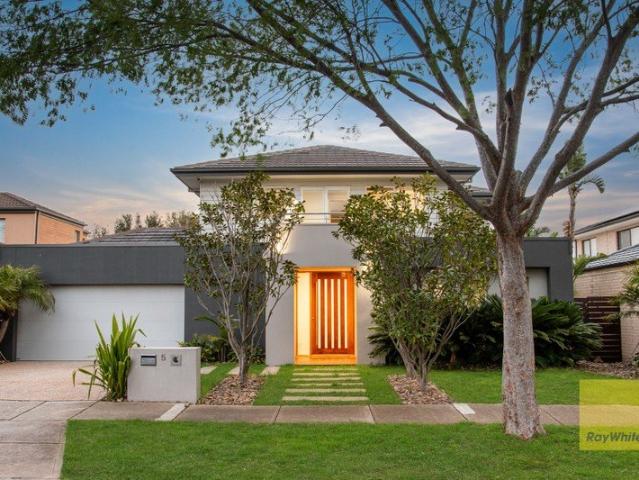 Refined Family Living Opposite Parkland!