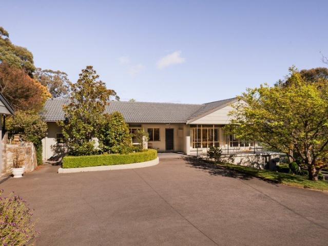 Refined Family Living with Impressive Gardens