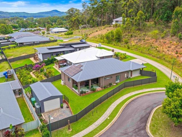 Refined Family Retreat With Spacious Living And Bushland Views