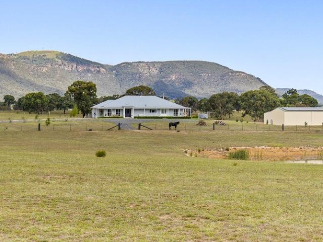 REFINED FARMHOUSE LIVING WITH STUNNING RURAL VISTAS