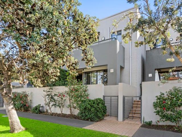 Refined Garden Residence with Private Courtyard & Exclusive Bay Street Access
