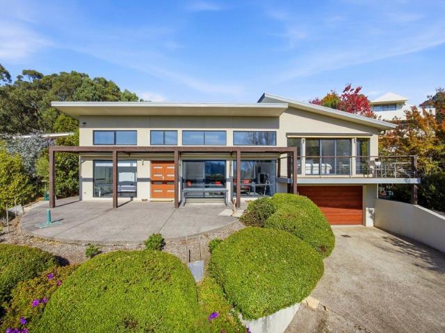 REFINED LUXURY WITH BREATHTAKING ELEVATED VIEWS