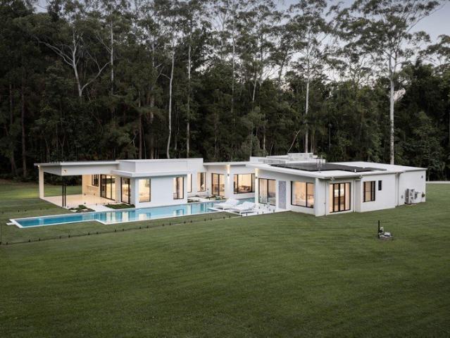 Refined Luxury Acreage Living with Resort Style Appeal