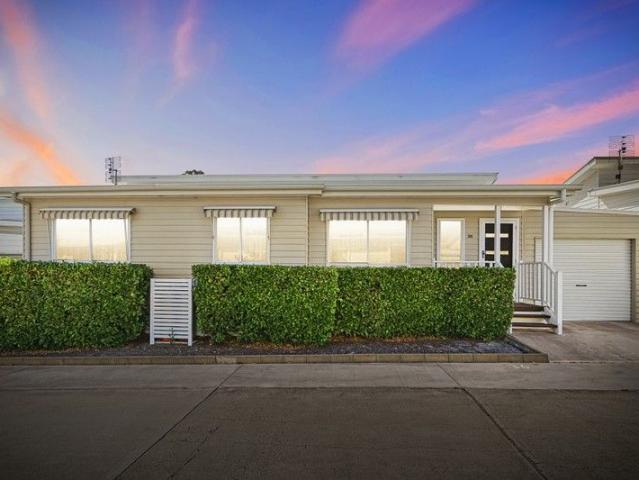 Refined Living in a Tranquil Over 55s Community