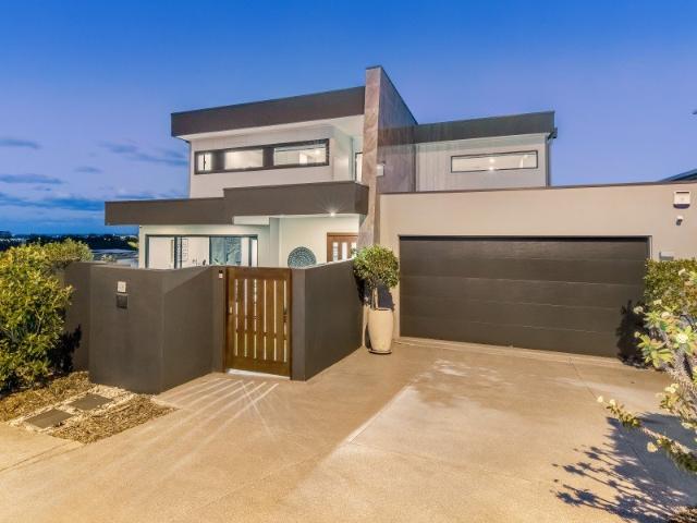 Refined Resort Style Living with Panoramic Skyline & Ocean Views