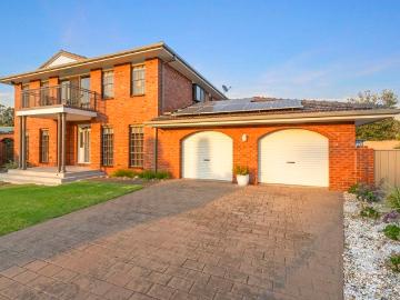 Refined Residence with Pool, Privacy and Sunrise Golf Views