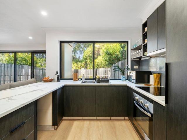 Refined Townhome Living with Resort Style Appeal