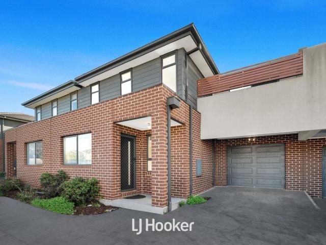 Refined Townhouse Living with Exceptional Family Appeal