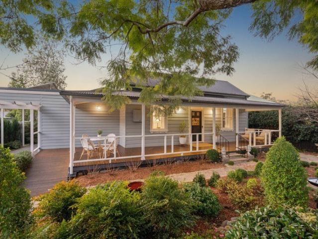 Refined Village Living in Beautifully Restored Jacaranda Cottage