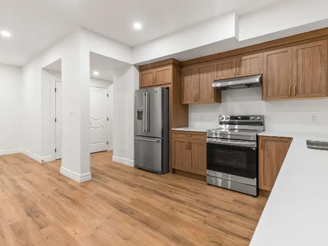 REFINED 2 BEDROOM LEGAL SUITE | ~1,250 SQ FT | CUSTOM HOME IN ASPEN GARDEN