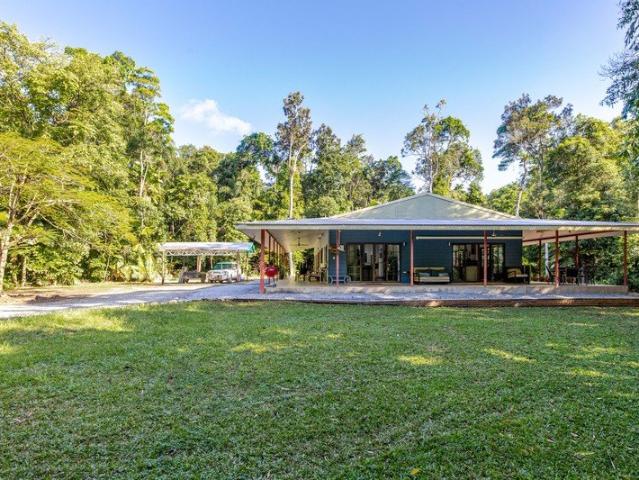 Refined 4 Bedroom Home with a Permanent Creek at your Door