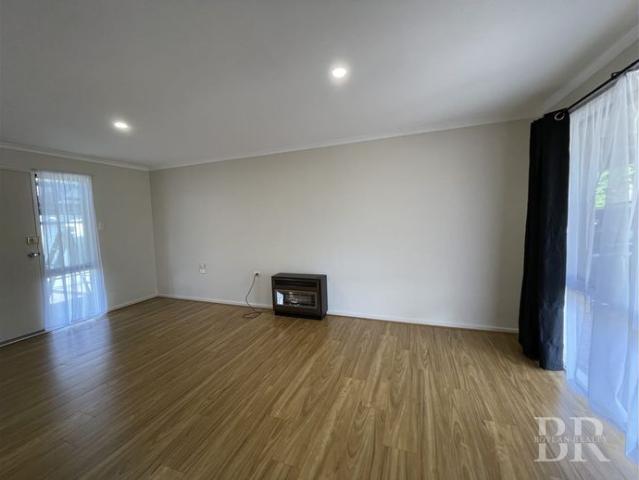 Refreshed Family Home with Spacious Yard and Powered Shed