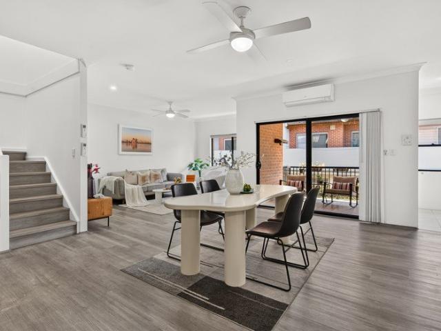 REFRESHED TOWNHOUSE STYLE LIVING WITH NORTH FACING BALCONY AND LOCK UP GARAGE