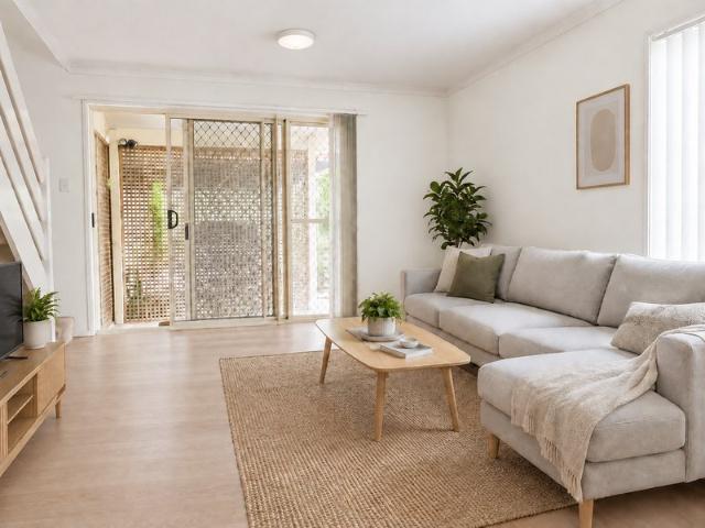 REFRESHED TOWNHOUSE WITH A STANDOUT PRIVATE COURTYARD