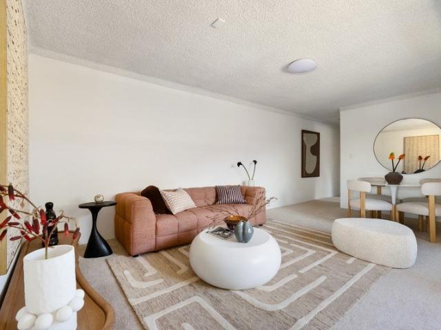 Refreshed top floor retreat close to village