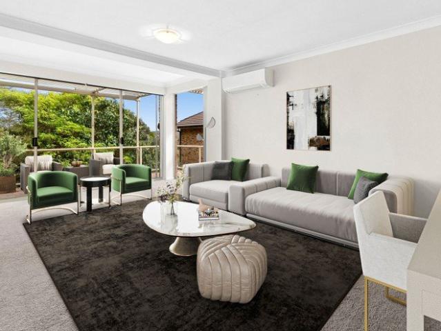 Refreshingly bright and spacious security apartment, sun washed leafy balcony and 10 minute stroll to Manly Beach